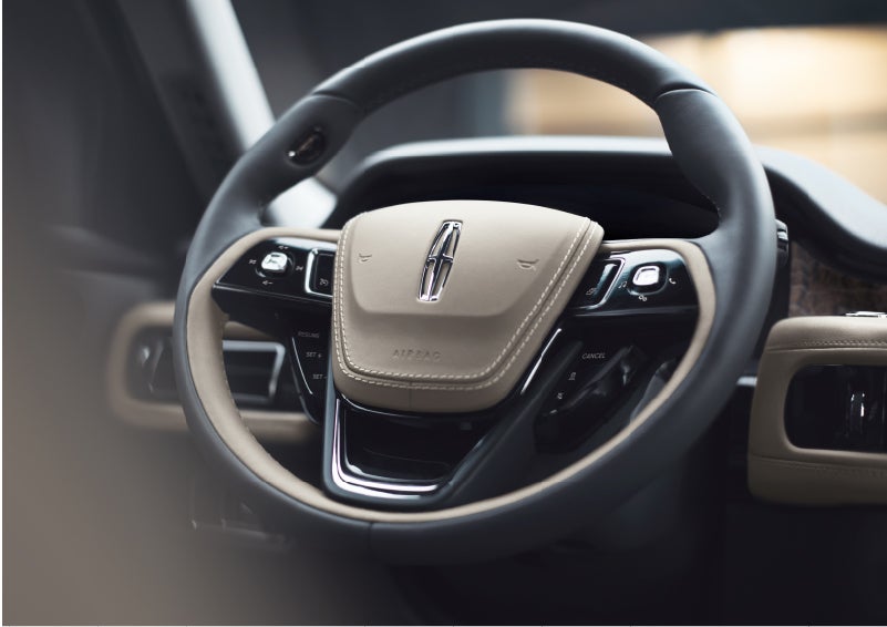 The intuitively placed controls of the steering wheel on a 2023 Lincoln Aviator® SUV | Gary Yeomans Lincoln in Daytona Beach FL
