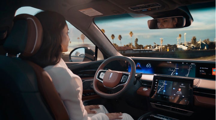 A person is shown driving hands-free on the highway with available Lincoln BlueCruise technology. | Gary Yeomans Lincoln in Daytona Beach FL
