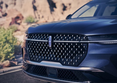 The stylish grille of a 2024 Lincoln Nautilus® SUV sparkles in the sunlight. | Gary Yeomans Lincoln in Daytona Beach FL