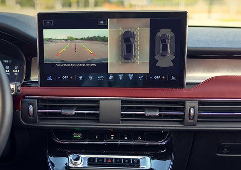 The driver of a 2024 Lincoln Corsair® SUV is shown selecting the drive mode. | Gary Yeomans Lincoln in Daytona Beach FL