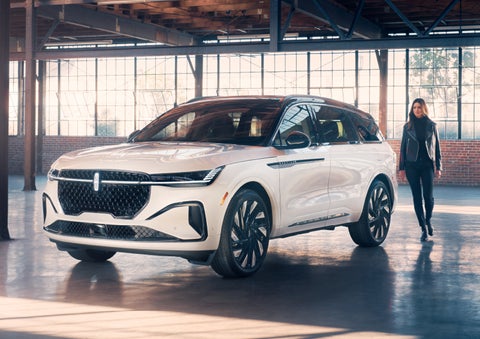 A person approaches a 2024 Lincoln Nautilus® SUV. | Gary Yeomans Lincoln in Daytona Beach FL