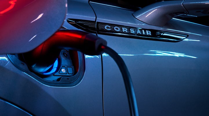 A charger plugged into the charging port of a 2024 Lincoln Corsair® Plug-in Hybrid model. | Gary Yeomans Lincoln in Daytona Beach FL