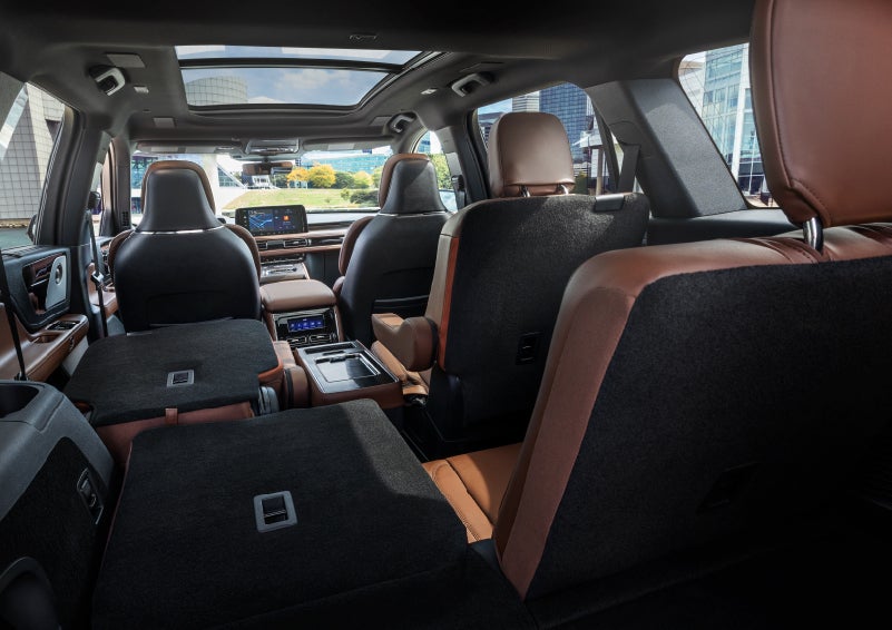The interior of the 2025 Lincoln Aviator® SUV is shown with two seats folded down for added space. | Gary Yeomans Lincoln in Daytona Beach FL