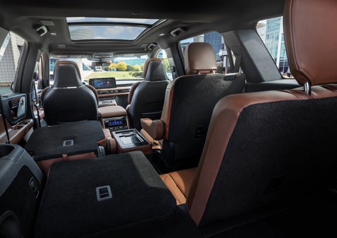 The interior of the 2025 Lincoln Aviator® SUV is shown with two seats folded down for added space. | Gary Yeomans Lincoln in Daytona Beach FL