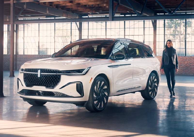 A person approaches a 2025 Lincoln Nautilus® SUV. | Gary Yeomans Lincoln in Daytona Beach FL