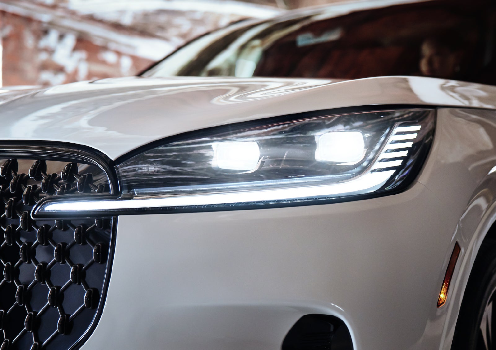 A close-up of a headlamp on the 2027 Lincoln Aviator® SUV is shown. | Gary Yeomans Lincoln in Daytona Beach FL