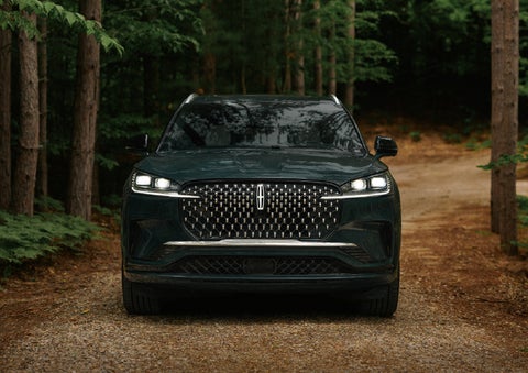 The front grille of a 2027 Lincoln Aviator® Black Label™ SUV is shown. | Gary Yeomans Lincoln in Daytona Beach FL